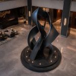 Ascension contemporary abstract steel sculpture by FORMA Sculptures, featuring elegant twisting forms that symbolize ambition, transformation, and the continuous pursuit of higher achievement in luxury architectural spaces.