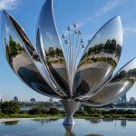 Elysian Petals contemporary stainless steel floral sculpture by FORMA Sculptures, featuring elegant mirrored petals inspired by nature that symbolize beauty, renewal, harmony, and the blossoming of life.