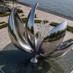 Elysian Petals contemporary stainless steel floral sculpture by FORMA Sculptures, featuring elegant mirrored petals inspired by nature that symbolize beauty, renewal, harmony, and the blossoming of life.