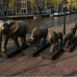 Kingdom of Giants monumental wildlife sculpture collection by FORMA Sculptures, featuring elephant, rhinoceros, lion, leopard, and gorilla sculptures for public parks, waterfronts, and luxury developments.