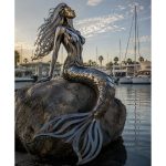 Marina Siren contemporary stainless steel mermaid sculpture by FORMA Sculptures, creating a landmark waterfront public art installation for marinas, luxury resorts, yacht clubs, and coastal developments.