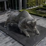 Momentum contemporary stainless steel bull sculpture by FORMA Sculptures, symbolizing strength, resilience, and financial growth for corporate headquarters, business districts, and landmark developments.