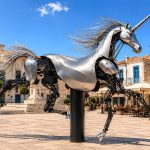 Pegasus Prime contemporary stainless steel unicorn sculpture by FORMA Sculptures, combining mechanical artistry and fantasy to create a landmark public art installation for luxury developments and cultural destinations.
