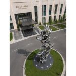 Phoenix Ascending contemporary stainless steel architectural sculpture by FORMA Sculptures, inspired by the mythical phoenix and designed as a landmark public art installation for luxury hotels, corporate headquarters, and cultural destinations.