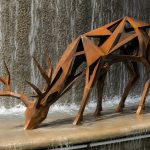 Silent Spring contemporary corten steel deer sculpture by FORMA Sculptures, featuring geometric forms inspired by wildlife for public parks, gardens, resorts, and landscape architecture.