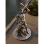 The Eternal Hero contemporary stainless steel monumental sculpture by FORMA Sculptures, depicting a mythical warrior with a lion, creating an iconic public art landmark for cities, parks, and cultural destinations.