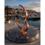 True North contemporary copper bow and arrow sculpture by FORMA Sculptures, symbolizing vision, purpose, and precision, designed as a landmark installation for marinas, waterfront developments, luxury resorts, and public spaces.