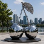 Twin Essence contemporary stainless steel architectural sculpture by FORMA Sculptures, creating a landmark public art installation for waterfronts, luxury developments, and urban plazas.
