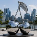 Twin Essence contemporary stainless steel architectural sculpture by FORMA Sculptures, creating a landmark public art installation for waterfronts, luxury developments, and urban plazas.