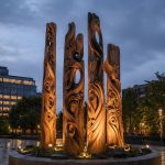 Whispers of the Forest contemporary monumental timber sculpture by FORMA Sculptures, featuring hand-carved organic forms inspired by nature for public art and urban landscapes.